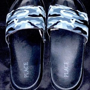 Camouflage, boy’s size 5 flip flops, gently used.